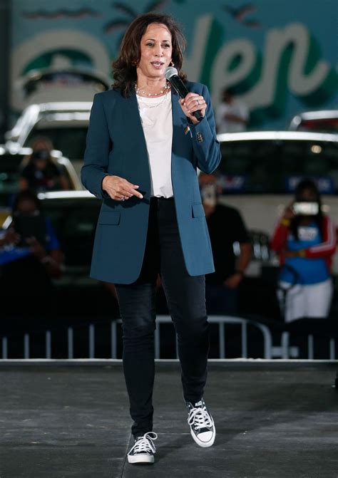 kamala wearing chuck taylors.